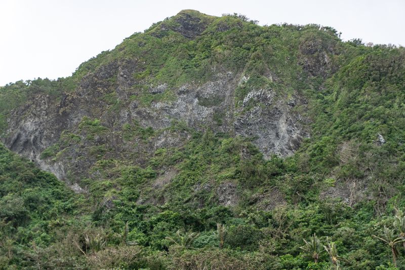 Cliff face behind Chavayan, to the North. Compared to Batan, seems to be igneous and volcanic.
