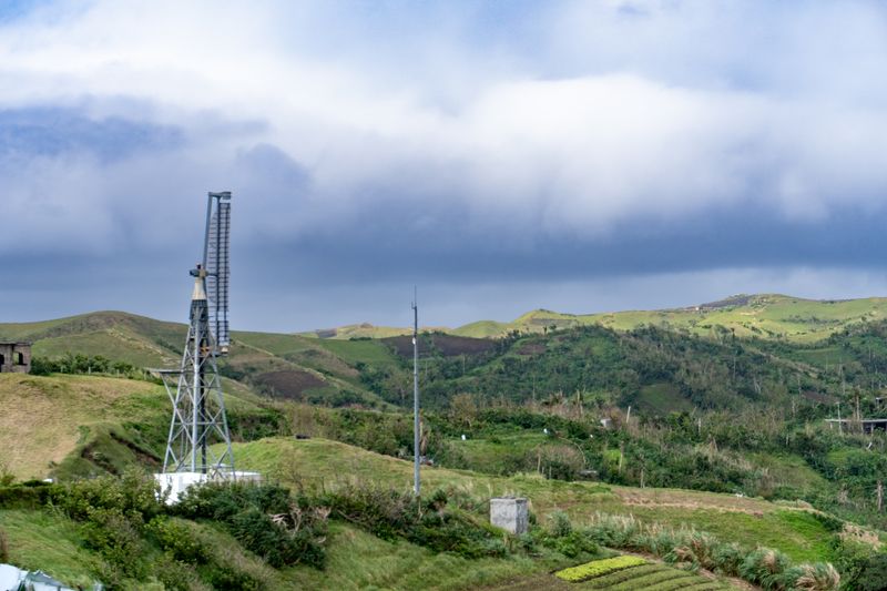 A destroyed wind turbine, also seen from Basco Lighthouse. See notes below.