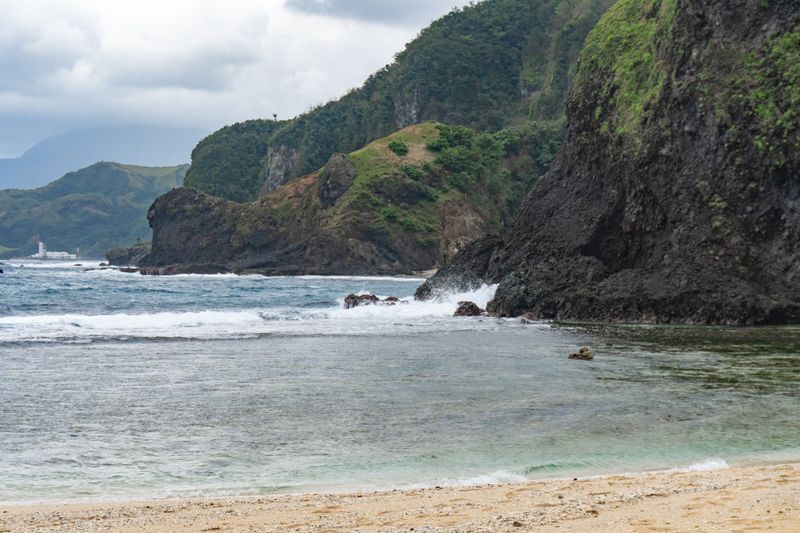 Waves crashing at Maydangeb. Basco and Iraya can be barely seen on the left.
