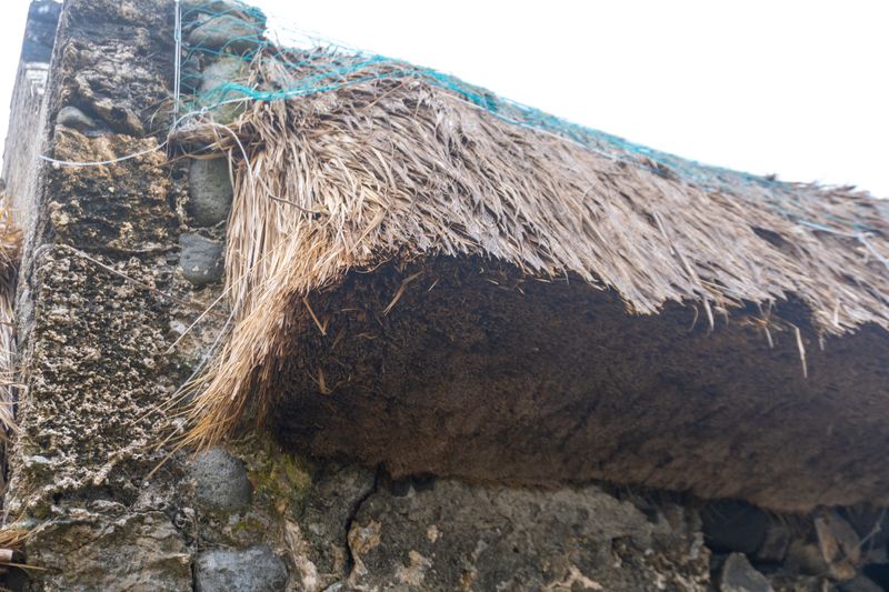 A close-up of the kugon roofing. Note how thick the material actually is.