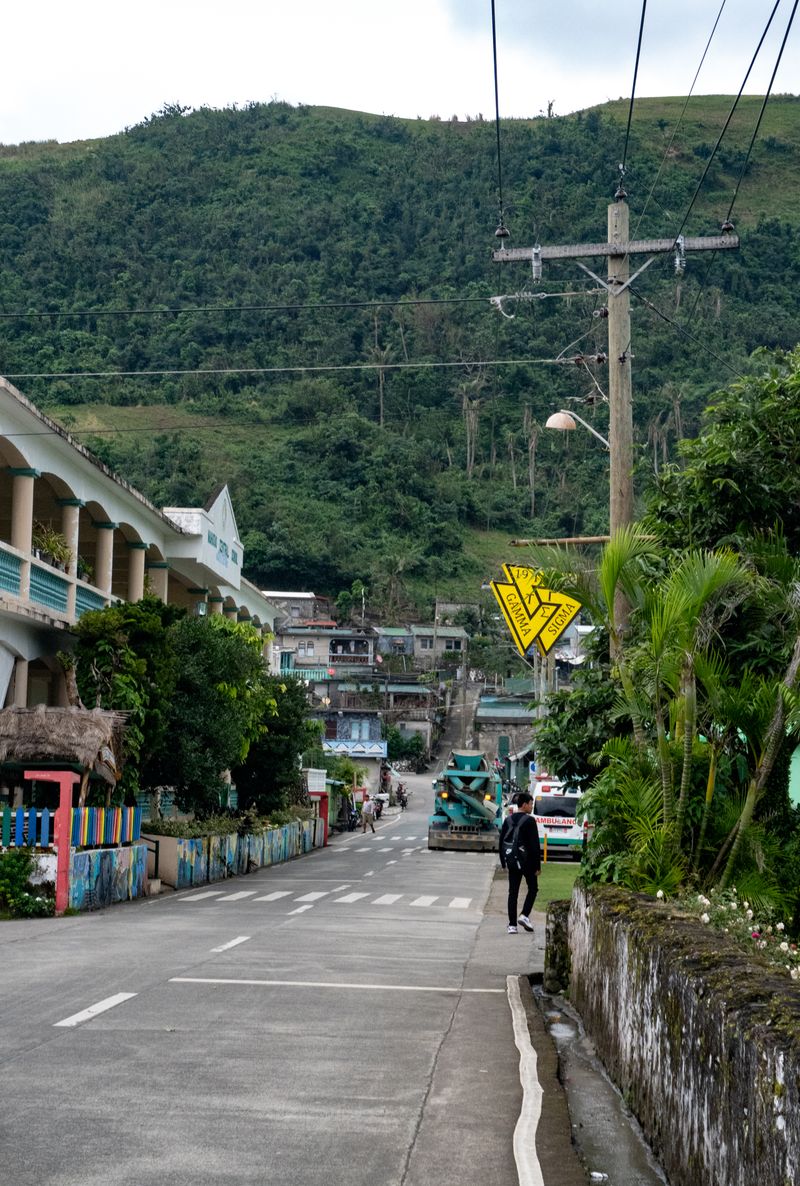 Life as usual in Mahatao. The Triskelion of Tau Gamma Phi reaches even the remote parts of the Philippines. With a 2024 population of ~1,700, even 50 members would mean there would be one Triskelion out of 50 in the town. Taken in front of San Carlos Borromeo Parish Church.