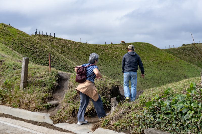 On an extremely short hike to a viewpoint in Basco's "Rolling Hills." Manny and my mom in frame. Even with the clearest weather during the trip, winds are still relatively strong.