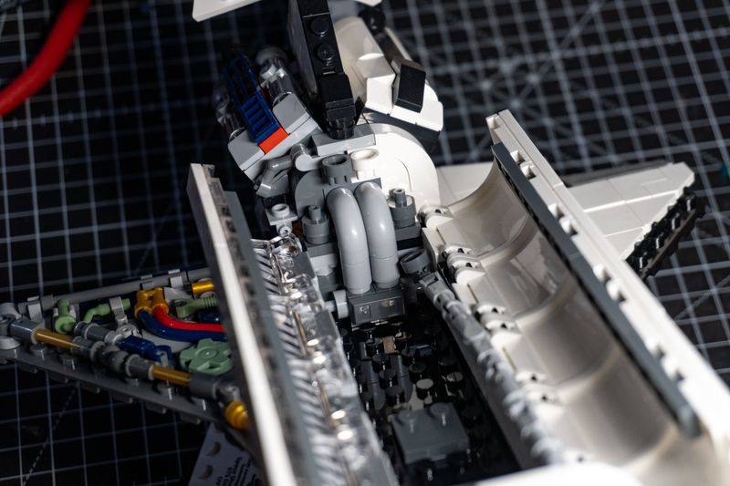 The cargo bay opens up! Some mock thruster piping at the rear.